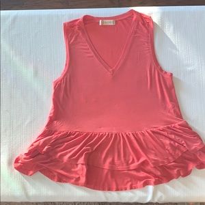 Altair’s state pink top with ruffles